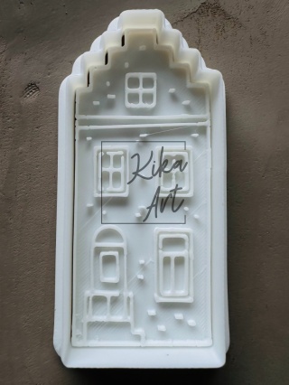 Stempel i wykrojnik kamieniczka ze schodkowym dachem